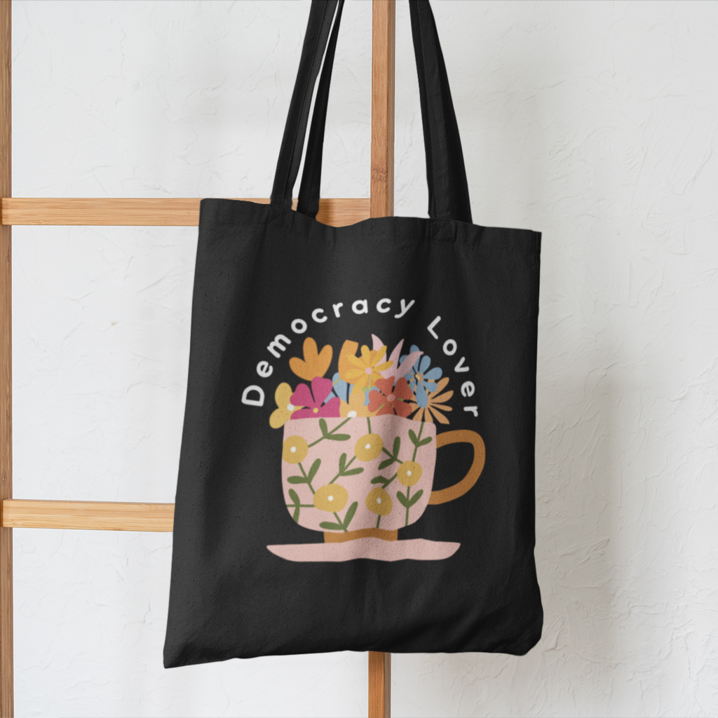Democracy Lover Black Tote Bag – Floral Mug Political Canvas Tote | Cozy Activism Reusable Bag | Progressive Gift for Democracy Supporters