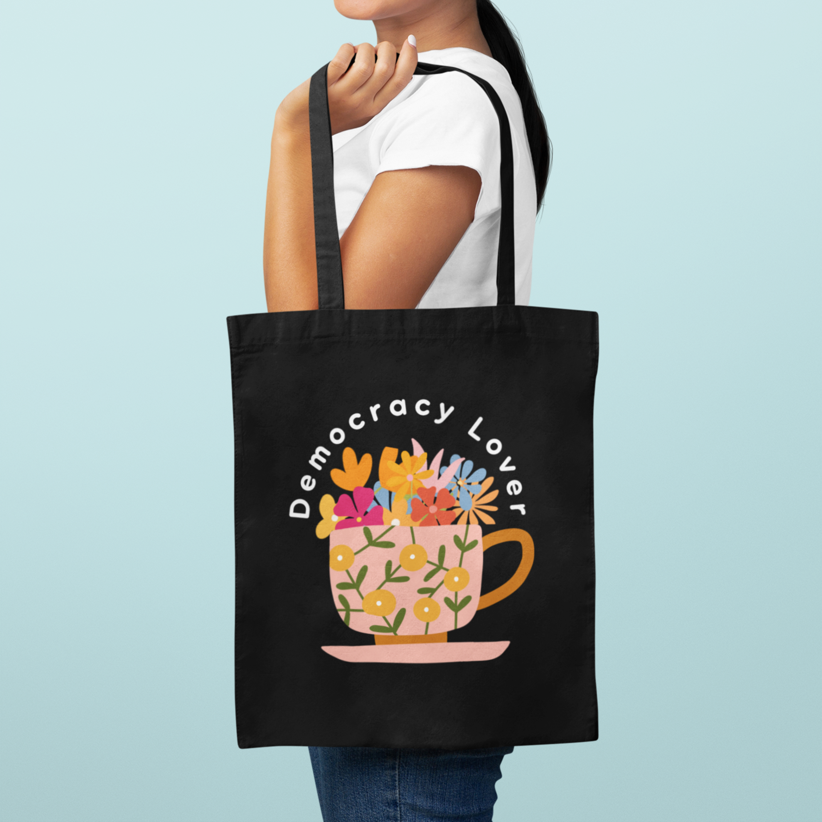 Democracy Lover Black Tote Bag – Floral Mug Political Canvas Tote | Cozy Activism Reusable Bag | Progressive Gift for Democracy Supporters