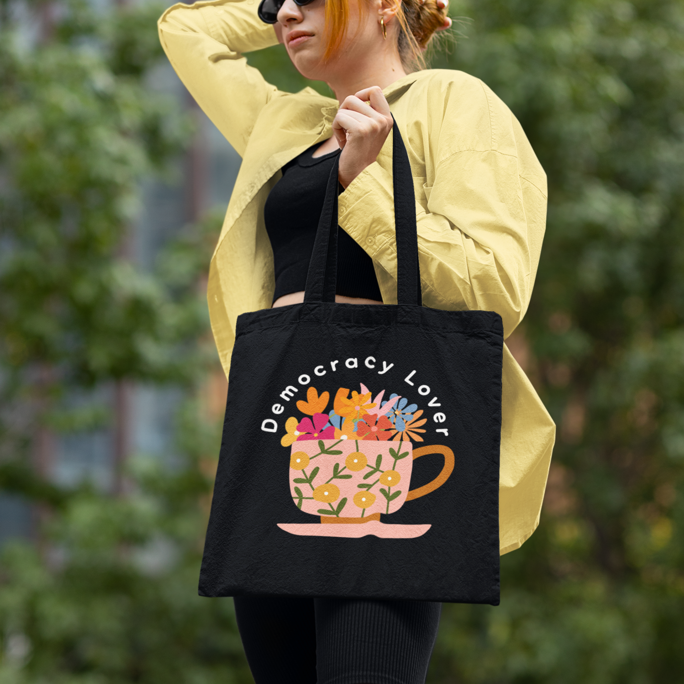 Democracy Lover Black Tote Bag – Floral Mug Political Canvas Tote | Cozy Activism Reusable Bag | Progressive Gift for Democracy Supporters
