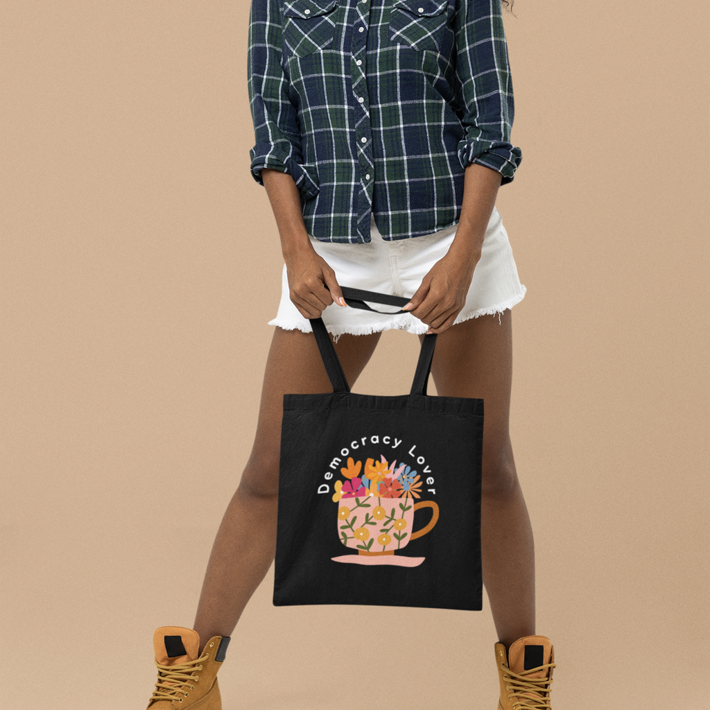 Democracy Lover Black Tote Bag – Floral Mug Political Canvas Tote | Cozy Activism Reusable Bag | Progressive Gift for Democracy Supporters