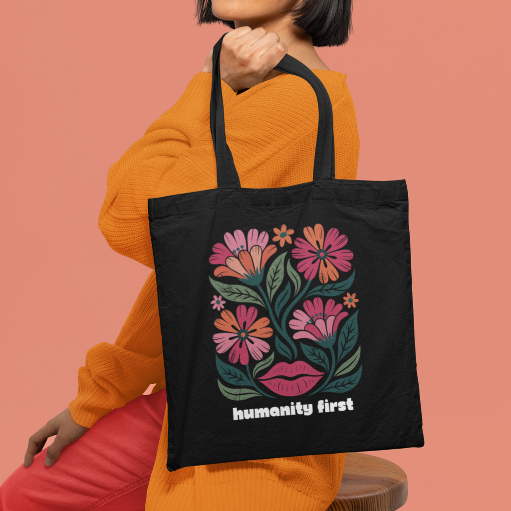 Humanity First Floral Tote Bag | Black Canvas Reusable Tote | Social Justice Art Bag | Progressive Values Tote | Ethical Everyday Carry